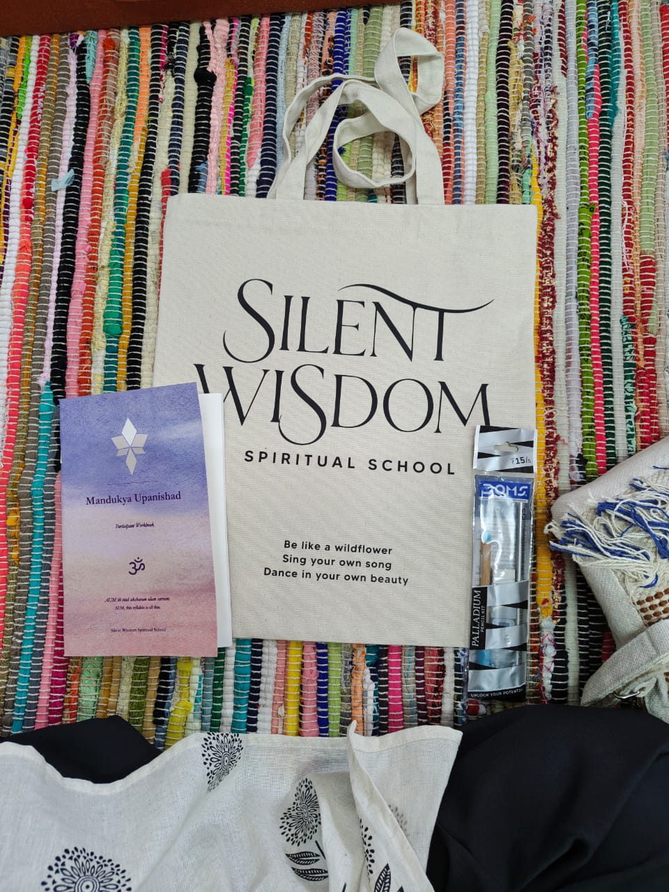 Silent Wisdom Spiritual School tote bag and Mandukya Upanishad workbook