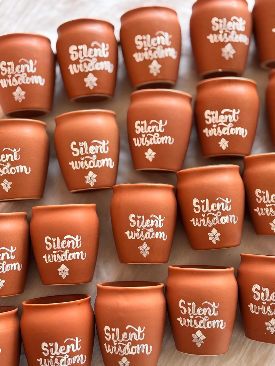 Silent Wisdom branded mugs